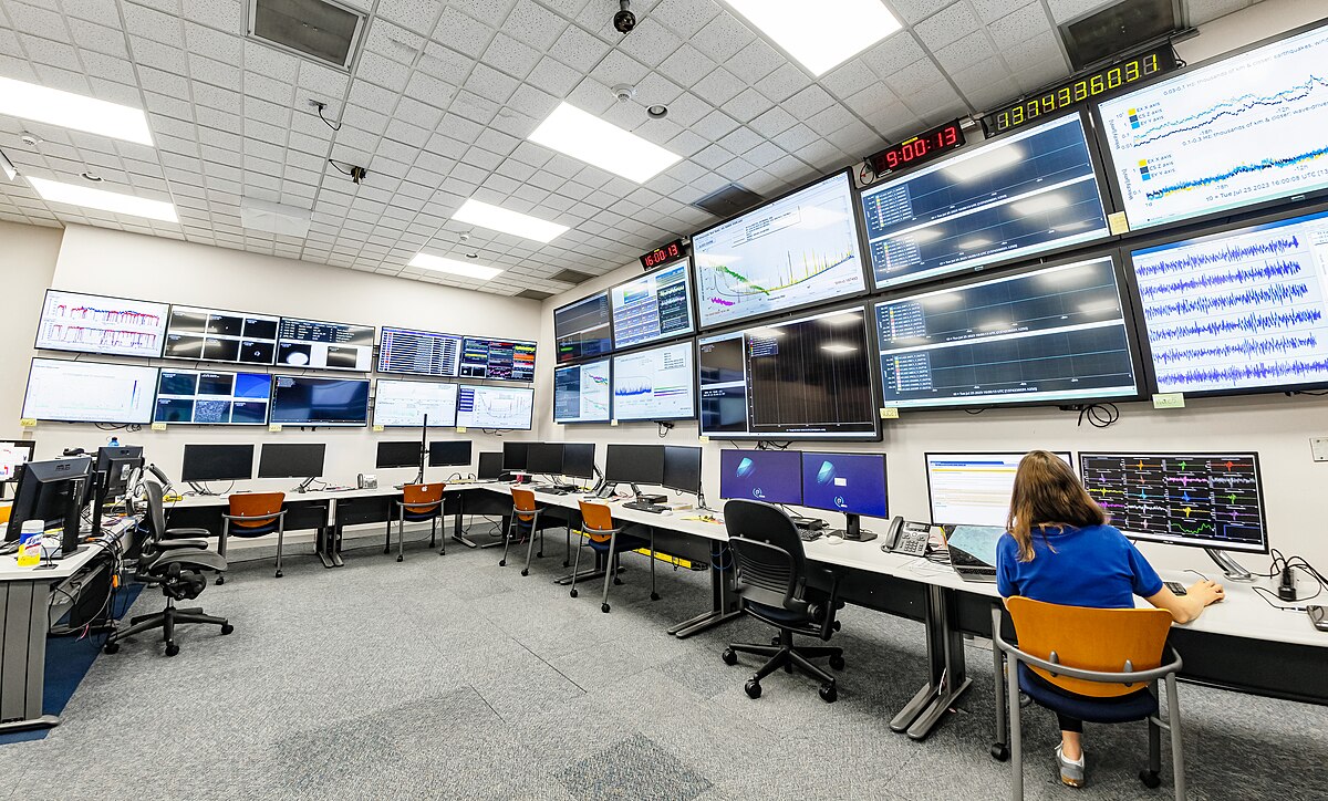 LIGO Hanford control room with banks of monitors showing real-time detector data